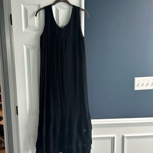 Midi black crinkle dress with detail at bottom and tie back